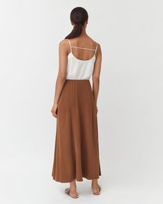 Our favorite statement skirt, now updated in Washable Silk, with a flowy, comfortable silhouette. Statement Skirt, Silk Maxi Skirt, Silk Maxi, Favorite Sweater, Wardrobe Style, Cold Day, Warm Weather, New Black, Wellness Design