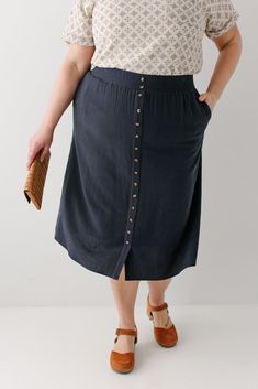 'Greta' Linen Blend Midi Skirt Knee-length Summer Bottoms With Buttons, Casual Maxi Skirt With Button Closure For Summer, Summer Linen Midi-length Bottoms, Casual Linen Midi Bottoms, Spring Relaxed Skirt With Buttons, Spring Long Skirt With Buttons, Relaxed Skirt With Buttoned Pockets For Spring, Long Skirt With Button Closure For Spring, Casual Summer Skirt With Buttoned Pockets