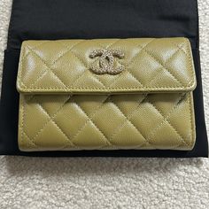 Chanel Wallet. Nwt. Never Used. Purchased March 2024 From Store In Rome, Italy. Original Packaging. Color Reminds Me Of Army Green. Designer Green Bag With Card Slots, Designer Green Bags With Card Slots, Luxury Green Bags With Card Slots, Formal Green Bags With Card Slots, Designer Gold Bifold Bag, March 2024, Chanel Wallet, Chanel Bags, Rome Italy