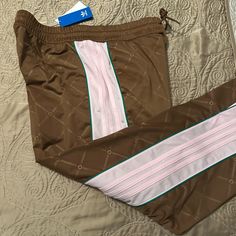 Nwt Track Pants Ladies Size 1x Brown/Pink/Green Designer Split Opening At Leg 1 Back Zipper Pocket Pink Adidas Pants For Loungewear, Casual Adidas Pink Pants, Adidas Casual Pink Pants, Casual Pink Adidas Pants, Pink Stretch Adidas Bottoms, Fitted Pink Adidas Bottoms, White Adidas Track Pants, Adidas Brown, Adidas Originals Logo