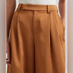 With Crisp Pleats And A Flattering High Rise, These Wide-Leg Pants Are Tailored With Luxurious Satin Charmeuse For A Beautiful Sheen And A Fluid Drape Approx. Model Height Is 5'10" And She Is Wearing A Size 4 Size 8 Has An Approx. 13-1/4" Rise And A 30-3/4" Leg Opening; All Sizes Have An Approx. 31-1/2" Inseam High Rise; Wide-Leg Silhouette Belt Loops Zip Fly With A Buttoned Closure Extended Waist Tab With A Hook-And-Bar Closure Two Front Waist Angled Pockets; Two Back Waist Welt Pockets Creases Run Down The Front And Back Of Each Leg Front Waist Pleats Back Waist Darts Polyester Hand Wash Or Dry Clean Straight Culottes For Workwear, Fitted Culottes For Summer Workwear, Fitted Culottes For Formal Occasions, Summer Workwear Fitted Culottes, Fitted Ankle-length Culottes, Fitted High-waisted Culottes For Work, Fitted Ankle-length Culottes For Work, Business Casual Culottes For Summer, Classic Culottes For Workwear