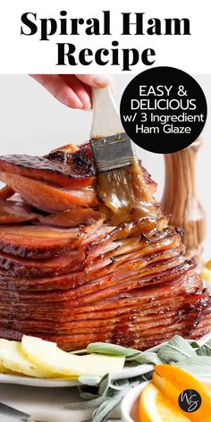 the cover of spiral ham recipe is being spread with a brush on top of it