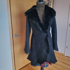 Made In France Genuine Kamb Shearling Above Knee Gently Used . Look Like New Exellent Preworn Condition No Stains, Hole Or Scratches Fresh Dry Cleaned Still Has Tag.Fits Size Xs Fitted Outerwear With Faux Fur Lining, Fitted Sheepskin Outerwear With Faux Fur Lining, Fitted Sheepskin Outerwear For Cold Weather, Elegant Long Sleeve Sheepskin Fur Coat, Elegant Shearling Outerwear With Faux Fur Trim, Fitted Shearling Fur Coat With Faux Fur Lining, Fitted Shearling Fur Coat For Winter, Elegant Shearling Fur Coat For Cold Weather, Fitted Elegant Shearling Fur Coat