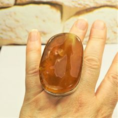 Giant AMBER RING with Adjustable size, Amber and 925 Silver, Huge amber stone, Heavy amber ring with rare natural amber, OOAK jewelry gift. Collectible amber. Museum quality. Anniversary gift. Amber lover gift. Untreated amber ring. AMAZING HUGE CLOUDY AMBER STONE! Beautiful genuine Baltic amber placed in artistic sterling silver frame with abstract design. Massive RAW just HAND POLISHED yellow cloudy amber stone with many layers. In perfect NEW  condition. Size of the face 2.25in x 1.5in x 1/2i Amber Jewelry Hammered, Modernist Ring, Rare Gifts, Amber Ring, Coin Ring, Natural Amber, Amber Stone, Amber Jewelry, Ring Unique