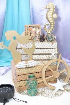 an assortment of seahorses, seashells and other items