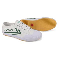 FE LO 1920 | White with Green Logo | Feiyue Shoes White Breathable Canvas Sneakers, Canvas Shoes With Gum Sole For Sports, Cotton Sneakers With Gum Sole For Sports, Cotton Sneakers With Rubber Sole For Sports, Sports Canvas Slip-on Shoes With Contrast Sole, Comfortable Cotton Canvas Sports Shoes, Comfortable Cotton Canvas Shoes For Sports, White Textile Canvas Shoes With Contrast Sole, White Canvas Shoes With Rubber Sole For Light Sports