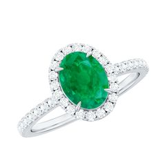 an oval emerald and diamond ring