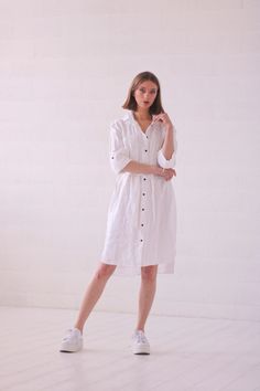 White linen shirt dress with belt. Perfect for women who likes a sporty, non-binding style. For those who want to emphasize the waist, the belt can be tied. You can wear this dress also as a light jacket or a long shirt with shorts or long pants. The length of sleeves are adjustable, so you can wear it in colder or warmer days.  The length of the front of the dress from the shoulder is 100 cm, and the back is 108 cm. Model's height 176 cm., wearing size S. All spring and summer Linen Sheep cloth Belted Linen Dress For Daywear, White Linen Shirt Dress For Daywear, White Linen Relaxed Fit Shirt Dress, Linen Dress With Tie Waist, Daywear Linen Dress With Tie Waist, Linen Dress With Tie Waist For Daywear, Knee-length Linen Shirt Dress, Summer Linen Belted Shirt Dress, White Belted Shirt Dress For Summer