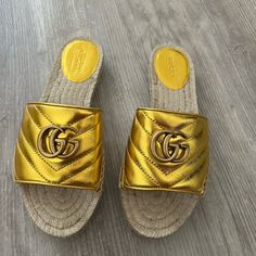 New With Dustbags And Box Designer Gold Sandals For The Beach, Gucci Gold Leather Sandals, Gucci Gold Designer Sandals, Gucci Luxury Beach Sandals, Designer Gucci Gold Sandals, Luxury Gucci Sandals For Vacation, Gucci Gold Round Toe Sandals, Gucci Gold Sandals With Round Toe, Gucci Gold Open Toe Sandals