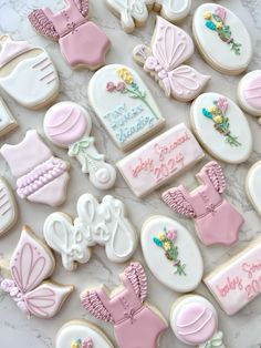 decorated baby shower cookies on a marble table