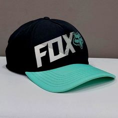 Rare! Effortlessly Cool, Sporty, And Chic Vintage Cap From Fox! Will Look Awesome With Any Outfit. Comes In Black With A Light Neon Green Brim. Desinged With A Distinct Fox Logo On The Crown, Structured Fit, Curved Bill, Five Panels, And Snapback Sizing Piece At Back. Very Comfy, Lightweight, And Breathable. Made From 100% Polyester. One Size Fits Most. Nwot From A Smoke-Free Home Black Summer Sports Hats, Summer Sports Black Baseball Cap, Black Six-panel Trucker Hat For Summer, Black Six-panel Snapback Hat For Summer, Sporty Black Summer Hats, Black Six-panel Summer Hat, Fox Logo, Vintage Fox, Vintage Cap