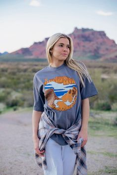 One of our most favorite designs is back and better. Meet the Rocky Mountain Tee-your new favorite graphic tee. Crafted in the USA, this tee is the perfect addition to your outdoorsy wardrobe. Whether you're summiting peaks or busting a move with the local wildlife, our tee ensures you're effortlessly rocking the Rockies in style! 🏞️🎉 Cotton T-shirt For Outdoor Activities In Fall, Outdoor Relaxed Fit Top With Front Print, Tri-blend Graphic Tee T-shirt For Outdoor, Graphic Tee T-shirt With Crew Neck For Hiking, Relaxed Fit Graphic Print Top For Adventure, Graphic Tee T-shirt With Screen Print For Outdoor Activities, Short Sleeve Tops For Fall Outdoor, Casual Tops With Front Print For Outdoor Activities, Short Sleeve Tops For Fall Outdoor Events