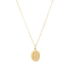 This dainty gold necklace is set with a miraculous coin pendant featuring Virgin Mary and a chain necklace. Made with high quality 14K gold filled materials and perfect for everyday wear - we love wearing it as a protection necklace. 14K gold filled pendant 14K gold filled necklace (Cable or Satellite) Pendant size: 9 x 13 mm, Thickness: 1.1 mm Comes with 2" extender Nickel-free