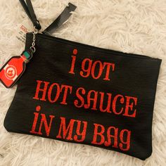 “I Got Hot Sauce In My Bag” Wristlet Clutch Never Used, Brand New With Tags. Purchased At Macy’s. Pretty Spacious Clutch. No Pockets Or Zippers Inside. In My Bag, Black Wristlet, Bags Black, Wristlet Clutch, My Bag, Chanel Deauville Tote Bag, Hot Sauce, Reusable Tote Bags, Sauce