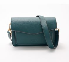 Just big enough to hold all of your essentials, the Tory crossbody boasts a contemporary look crafted in luxe pebbled leather. The gusset expands to grows as your fill it, and an adjustable strap provides ultimate convenience. From American Leather Co. Antique Hardware, American Leather, Dark Teal, Fashion Handbags, Pebbled Leather, Leather Crossbody, Zip Pockets, Adjustable Straps, Handbags