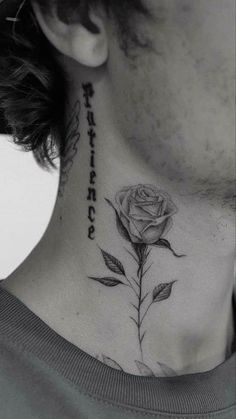 a woman with a neck tattoo that has a rose on it and the words, love is