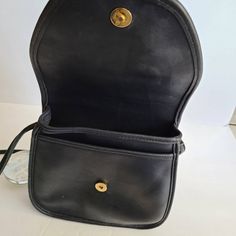 "Vtg Coach Original Lindsay Bag Roomy interior with inner zipper pocket, outer full size slip pocket covered by a flap and secured by a magnetic button Attatched 47\" shoulder strap Measures: 9.5\"L, 9.5\"H, 2\"W Made in the United States #E4B-9888 Flaws: small indents on the bottom of the back Cleaned, conditioned and ready to wear! Questions? Just ask More vtg coach styles/colors also available" Retro Business Shoulder Bag With Detachable Strap, Vintage Shoulder Bag With Adjustable Strap For Office, Vintage Crossbody Saddle Bag For Business, Retro Saddle Shoulder Bag With Detachable Strap, Vintage Crossbody Shoulder Bag For Business, Retro Business Crossbody Shoulder Bag, Vintage Satchel Flap Bag For Formal Occasions, Vintage Flap Bag With Detachable Strap For Formal Occasions, Retro Satchel With Adjustable Strap For Formal Use