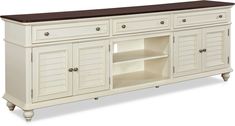 a large white cabinet with drawers and doors on it's sides, in front of a white background