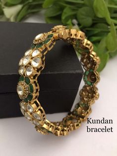 Material:  brass, Cz Stone, Kundan Polk Stunning Gold Bracelet with Royal and Elegant look. You can wear this with any kind of outfits like Kurtis, lehanga, Sarees and Trousers and Denims. Most eligible gift for someone you love and someone very special for you. Best gift for your anniversary. Best gift for her Birthday. Bracelet : 1 Arrives in a small plastic box. For any queries please contact me. Heavy Green Kundan Bracelets, Traditional Kundan Jeweled Bracelets, Ceremonial Kundan Jeweled Bracelets, Jadau Bracelet, Kundan Bracelet, Sabyasachi Bridal, Jewelry Royal, Sabyasachi Jewellery, Birthday Bracelet