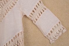 "Fringe Crochet womens top ,crochet fringe beach top, Summer Fashion Women's tops,Womens Blouse **.♥.**'.♥.**'.♥.**'.♥.**'.♥.**'.♥.** This crochet beach top made from soft pure cotton. It functions as a fun summer top paired with shorts or jeans and as a bikini for those heady summer beach days! Great for the holiday at the seaside.Unique look **.♥.**'.♥.**'.♥.**'.♥.**'.♥.**'.♥.** Measured 30\" in length with tassels, stretched to 43\" in bust circumference If you need it to be made in a differe Beige Beachy Top For Beach Cover-up, Bohemian Hollow Out Tops For Spring, Beige Hollow Out Tops For Summer, Beige Hollow Out Top For Summer, Beige Hollow Out Summer Top, Beachwear Tops With Crochet Trim For Beach Cover-up, Spring Beachwear Crochet Top With Crochet Trim, Summer Bohemian Crochet Top With Fringe, Beach Tops With Crochet Trim For Beachwear