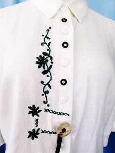 White Shirt With Floral Embroidery Collar, White Bohemian Button-up Shirt, White Bohemian Collared Shirt, Traditional White Shirt With Chikankari Embroidery, White Bohemian Blouse With Machine Embroidery, White Collared Bohemian Top, White Bohemian Collared Top, Bohemian White Collared Top, White Folk Shirt With Floral Embroidery