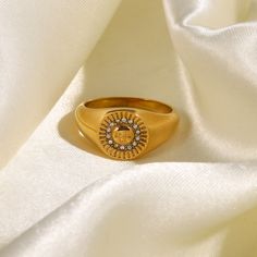 The Sunny Signet Gold Ring is bright and shiny way to sport a gold signet ring in an eclectic way. Crafted in stainless steel with 18 karat gold inlay and AAA zircons, this signet ring is built to last. Waterproof, hypoallergenic, and meant to daily wear. Gold Stainless Steel Signet Promise Ring, Gold Stainless Steel Signet Ring For Anniversary, Gold Stainless Steel Signet Ring, Tarnish Resistant, Classic Gold Stainless Steel Signet Ring, Best Friend Rings, Friend Rings, Ring Elegant, Friendship Rings, Gold Statement Ring