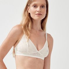 Brand New With Tags Size: S Details + Design: Wireless Lace Bralette. Adjustable Shoulder Straps. Hook-And-Eye Back Closure. Material: Body: 85% Nylon, 15% Spandex; Backing: 96% Nylon, 4% Spandex; Body Lining: 100% Nylon Care: Hand Wash; Line Dry Spring Lace Beige Bra, Elegant Beige Bra For Spring, Spring Beige Lace Bra, Elegant White Summer Bra, Feminine Cream Lace Bra, Cream Bra With Delicate Lace, Cream Delicate Lace Bra, Elegant Beige Summer Bra, Summer Lace Bra In Cream Color