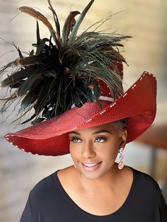 Expertly crafted in a satin brick color, this hat boasts large matching feathers and sparkling rhinestone details. Perfect for making a statement at any event, this hat adds a touch of elegance and glamour to any outfit. Elevate your style with this sophisticated accessory. Formal Red Feathered Hat, Formal Red Hat With Feathers, Elegant Red Feather Trim Fascinator, Elegant Red Fascinator With Feather Trim, Evening Hats With Ostrich Feather Trim, Chic Party Hats With Feather Trim, Chic Party Hat With Feathers, Elegant Red Hat With Feathers, Glamorous Evening Hats For Kentucky Derby