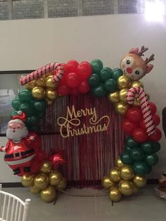 christmas balloon arch with santa clause and reindeer