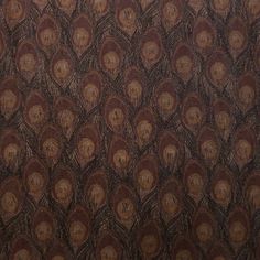 an image of a brown and black wallpaper with many circles on the surface that looks like feathers