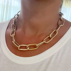 This Italian handcrafted chain link necklace is completely composed of 14K solid gold and is uniquely made with a semi-hollow interior for comfortable everyday wear that will not dent. NOTE: This item is available in longer or shorter length options. Kindly email us for pricing and details. Total Length: available in your choice of 14, 16, 18, 20, 22, 24, 26 or 30 inches Total Gram Weight: 18" length comes out to approximately 33.8 grams of 14K solid gold Link Dimensions: approximately 14mm (W) Gold Oval Cable Chain Jewelry, Yellow Gold Chunky Chain Jewelry With Oval Links, Luxury Gold Oblong Jewelry, Gold Plated Oval Gold Chain Jewelry, Gold-plated Oval Gold Chain Jewelry, Oval Gold-plated Gold Chain Jewelry, Oval Yellow Gold Paperclip Chain Jewelry, Oval Yellow Gold Jewelry With Paperclip Chain, Gold-tone Oval Jewelry With Gold Chain