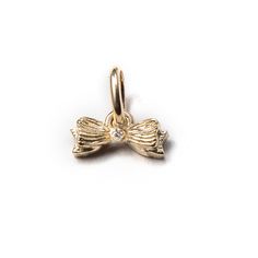 The Bow Charm is a part of The PATCH NYC x M. FLYNN Collection, a collaboration between two South End shops, M. Flynn and PATCH NYC. Read our blog post to learn more!

PATCH NYC founder, Don Carney creates intricately painted India ink drawings that translate perfectly into beautifully textured 14k gold charms. Each brilliant charm is accompanied by a signed print of the original ink drawing that inspired its creation. Luxury Butterfly Charm Jewelry For Formal Occasions, Luxury Gold Jewelry With Butterfly Clasp, Original Ink Drawing, Gold Charms, Ink Drawings, India Ink, Diamond Charm, Gold Charm, Pink Sapphire