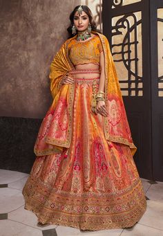 Yellow banarasi silk circular lehenga choli 10283  Desc:  Style : Circular Lehenga Choli Color : Yellow Fabric : Banarasi Silk Work : Sequence   Embroidery Wash Care : Dry clean Sleeve Style : Short Sleeve Long Sleeves : Done only in Custom Stitch Sleeves Lining : Done only in Custom Stitch Bust Size : 32 to 42 Inches Occasion : Wedding   Mehendi   Sangeet   Engagement   Bridesmaid   Reception   Ceremonial. With Express Free Shipping and Custom Stitching, Buy Lehenga - Indian Party wedding and b Anarkali Lehenga Gowns, Wedding Mehendi, Orange Lehenga, Anarkali Lehenga, Sequence Embroidery, Yellow Lehenga, Wedding Saree Collection, Salwar Dress, Yellow Ombre