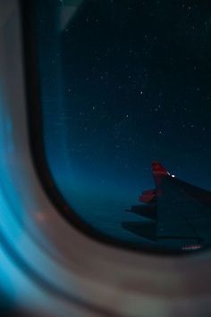 the view from an airplane window at night