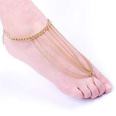 Treat your toes to timeless elegance thanks to this dainty anklet and toe ring set that flaunts shimmering 18k gold-plated chains for beauty in every glance. Anklet: 8.66" L with 2.36" extender Linking Chain : 2.95" L Lobster claw clasp 18k gold-plated copper Gold Metal Anklets For Summer, Gold Chain Anklets For Summer, Summer Delicate Gold Chain Body Jewelry, Gold Adjustable Chain Anklet For Summer, Gold Anklets With Adjustable Chain For Summer, Adjustable Gold Chain Jewelry For Summer, Adjustable Gold-plated Anklets, Adjustable Gold Plated Anklets, Adjustable Metal Anklets With Gold Chain