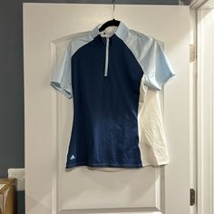 Upf 50 Outside Active Top Sporty Blue Shirt, Adidas Navy Short Sleeve Tops, Sporty Blue Golf Shirt, Adidas Navy Sports Top, Adidas Cotton Golf Tops, Navy Adidas Sporty Top, Adidas Navy Sporty Tops, Navy Sporty Adidas Tops, Adidas Blue Sporty Shirt