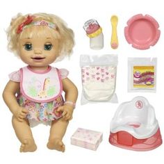 a baby doll is sitting next to its accessories