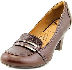 Modern hardware and exotic trim enhance this tailored look. Features a padded heel collar, leather lining, leather comfort footbed, and a stacked heel. Heel Height: 2 1/2" Full-grain leather upper New without Box Modern Hardware, Round Toe Pumps, Salvatore Ferragamo Flats, Stacked Heel, Full Grain Leather, Heel Height, Leather Upper, Grain, Pumps