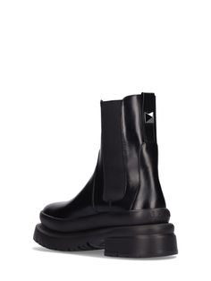 Leather upper. Back pull loop . Side elastic inserts. Treaded rubber sole Black Chelsea Boots, Leather Chelsea Boots, Studded Leather, Valentino Garavani, Black Men, Chelsea Boots, Rubber Sole, Chelsea, Leather Upper