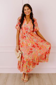 - Drape yourself in petals and twirl in the sun with this airy dress! - Chiffon material with a colorful abstract floral print - A built-in lining that ends above the ruffled hemline - A ruffled v-cut neckline with a tie detail - Short, loose ruffled sleeves - Pleated detail at the bodice - An elastic waistline - A flowy yet flattering silhouette that ends in a ruffled maxi length hemline Airy Dress, Abstract Floral Print, Chiffon Material, Ruffled Sleeves, V Cuts, Abstract Floral, Bodice, Coral, Chiffon