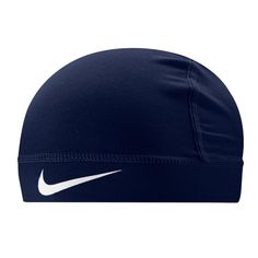 the nike performance beanie is shown in navy blue and has a white nike logo on it