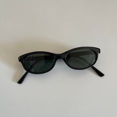 These MINI round oval sunglasses are your everyday classic. Featuring a black frame with black tint lens. This style is unisex. True genuine vintage sunglasses from the 90s.  400 uv  new vintage  includes sunglasses pouch   Style 008 Small Sunglasses 90s, 90s Sunglasses Aesthetic, Dapper Day Outfits, 90s Sunglasses, Small Sunglasses, Black Cat Eye, Sunglasses Pouch, Dapper Day, Black Cat Eyes