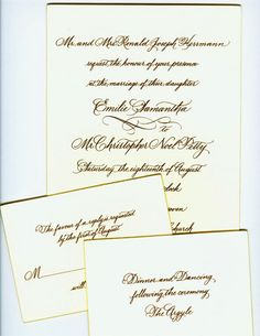 three wedding cards with gold lettering on them