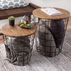 two tables sitting on top of a rug next to a wooden bench