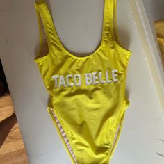 Private Party Swimsuit Taco Belle Costume Never Worn! Small/Medium Size. Perfect Halloween Costume Yellow Stretch One-piece Beachwear, Spring Fun Fitted Bodysuit, Spring Fitted Bodysuit, Fitted Fun Bodysuit For Spring, Trendy Sleeveless Party One Piece, Fun Fitted Spring Bodysuit, Yellow Beachwear Bodysuit For Swimming, Yellow Beachwear One-piece For Poolside, Yellow Beachwear One Piece For Poolside