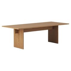 a wooden table sitting on top of a white floor