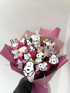 a bouquet of flowers with stickers on it