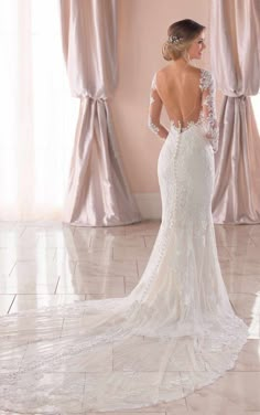 a woman in a wedding dress looking back