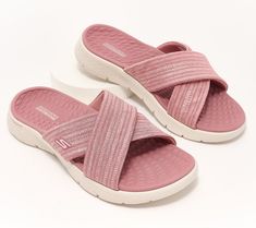 Your journey from the resort lobby to the sand or your neighbor's patio to the pool deck is comfier (and way cuter) in these flexible GoWalk slides with Goga Mat cushioning. From Skechers. Pink Textured Footbed Slippers For Vacation, Pink Slippers With Textured Footbed For Vacation, Pink Vacation Slippers With Textured Footbed, Vacation Pink Slippers With Textured Footbed, Pink Slippers With Removable Insole For Beach, Pink Beach Slippers With Removable Insole, Adjustable Non-slip Sandals For Poolside, Adjustable Lightweight Slides For Vacation, Pink Slides With Textured Footbed For Vacation