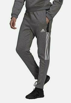 Adidas Men Tiro 21 Sweat Pants Grey  (GP8802) TAPERED SWEAT PANTS FOR OFF-PITCH COMFORT. Relax, regroup, recover. These adidas sweat pants are ideal for the quieter moments of soccer, like stretching before a match or heading home when training is over. The cotton-blend fleece feels soft and cozy. Zip pockets keep essentials close. This product is made with recycled content as part of our ambition to end plastic waste. WASHING INSTRUCTIONS Do not bleach Tumble dry low heat Do not dry clean Touch Adidas Sweat Pants, Adidas Sweat, Iron Machine, Adidas Sweatpants, Active Wear Pants, Sweat Pants, Plastic Waste, Touch Up, Washing Instructions